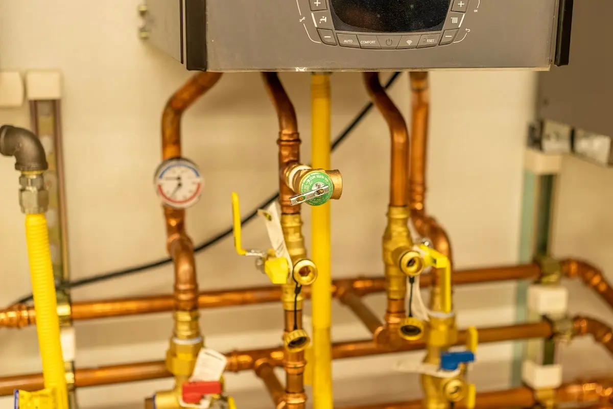 Licensed technician providing Water Heater Installation for a homeowner in Macomb